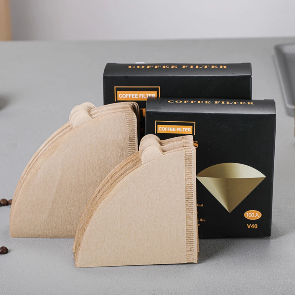 100pcs Disposable Coffee Filter Paper V Shape Cone Dripper Coffee Filters Cups Natural Wood Pulp Filters Espresso Drip Tools
100pcs Disposable Coffee Filter Paper V Shape Cone Dripper Coffee Filters Cups Natural Wood Pulp Filters Espresso Drip Tools