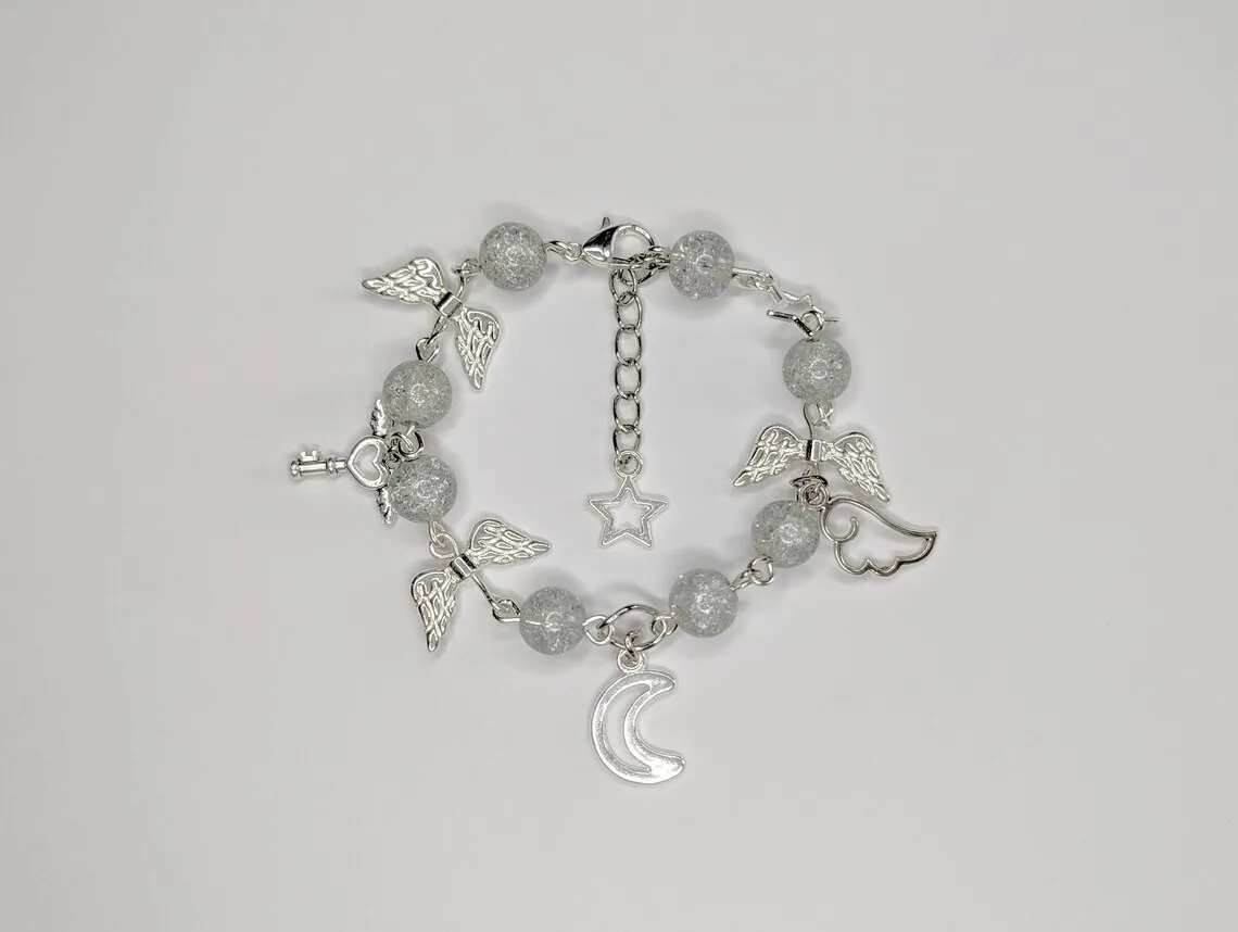 Grey Angel Wing Beaded Charm Bracelet - {Bearies} (pastel goth, grunge, y2k, fairycore, kawaii)
Grey Angel Wing Beaded Charm Bracelet - {Bearies} (pastel goth, grunge, y2k, fairycore, kawaii)