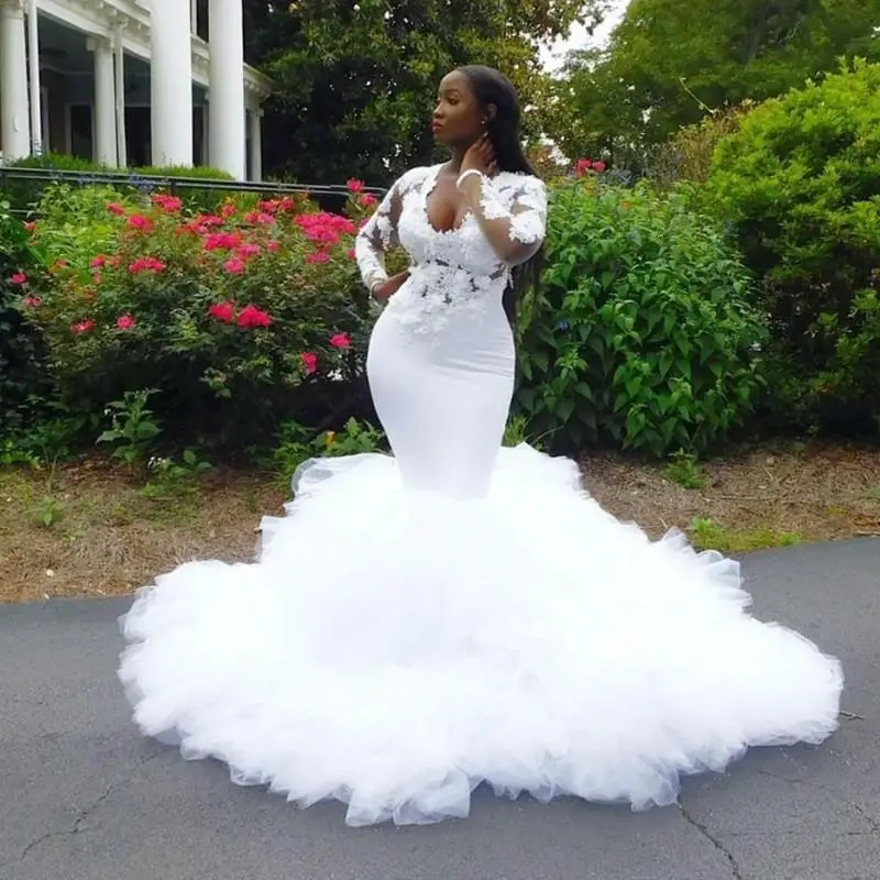 African Mermaid Ruffles 3D Lace Appliques Plus Size Wedding Dress Illusion Long Sleeves Bridal Gowns
African Mermaid Ruffles 3D Lace Appliques Plus Size Wedding Dress Illusion Long Sleeves Bridal Gowns