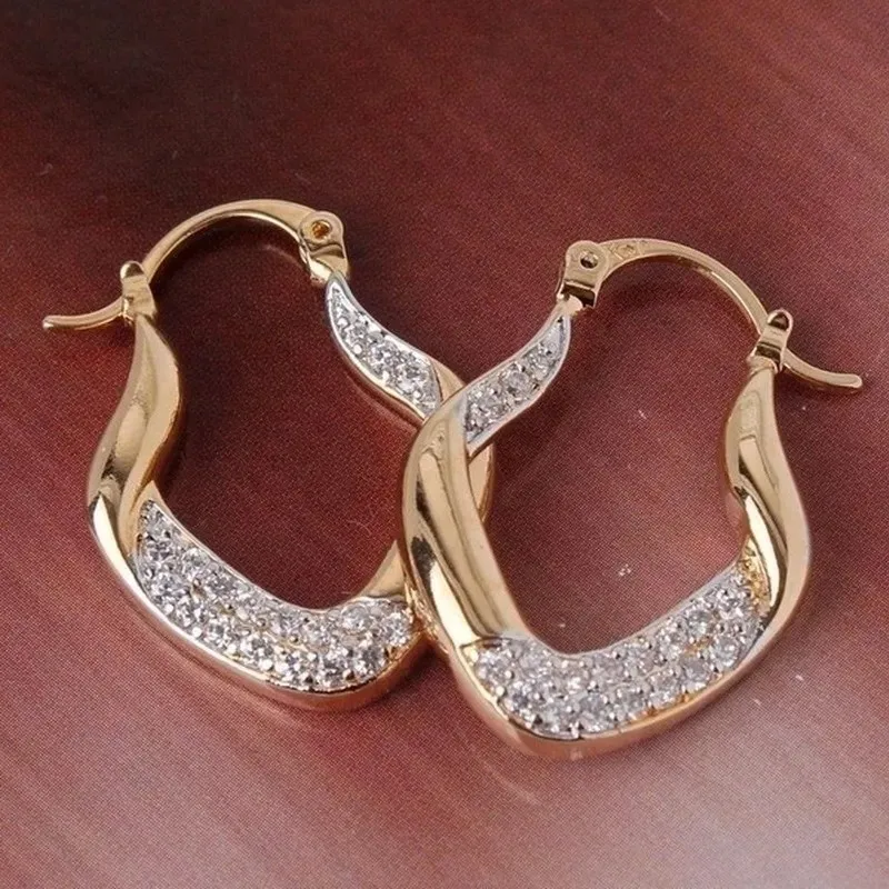 Elegant Noble Gold Color Metal Inlaid with White Zircon Dangle Earrings Trendy Bride Engagement Wedding Female Jewelry
Elegant Noble Gold Color Metal Inlaid with White Zircon Dangle Earrings Trendy Bride Engagement Wedding Female Jewelry