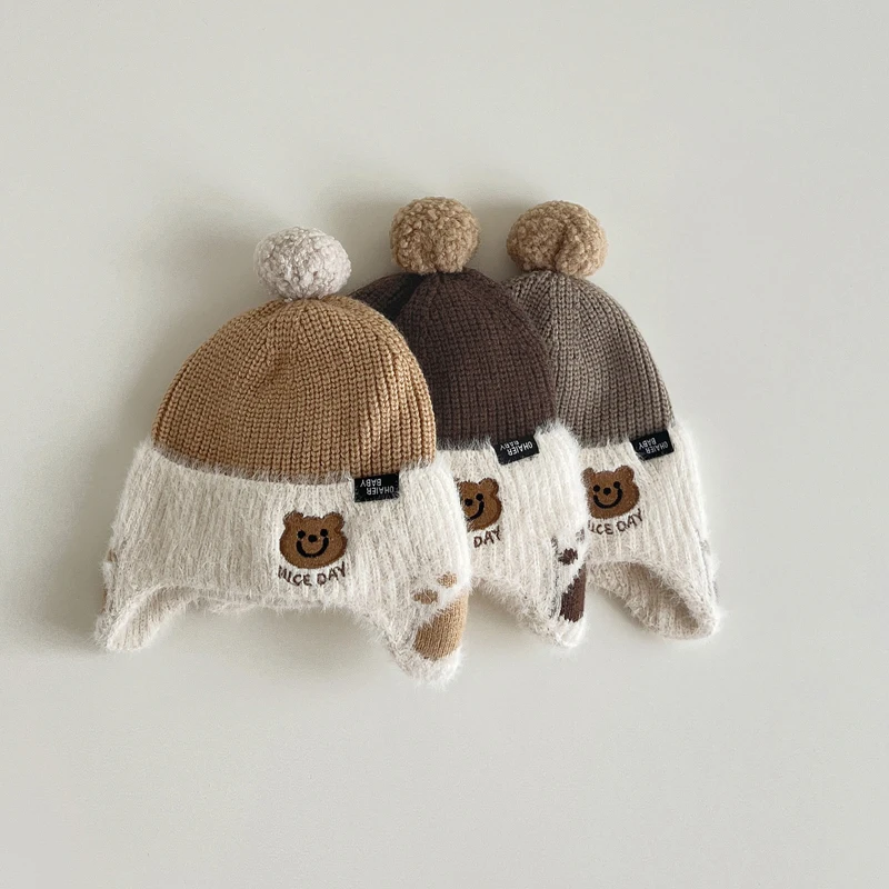 Зимние детские шапки для защиты ушей, утепленные мягкие теплые вязаные шапки для мальчиков и девочек, детская шапка с милым рисунком медведя 
Зимние детские шапки для защиты ушей, утепленные мягкие теплые вязаные шапки для мальчиков и девочек, детская шапка с милым рисунком медведя