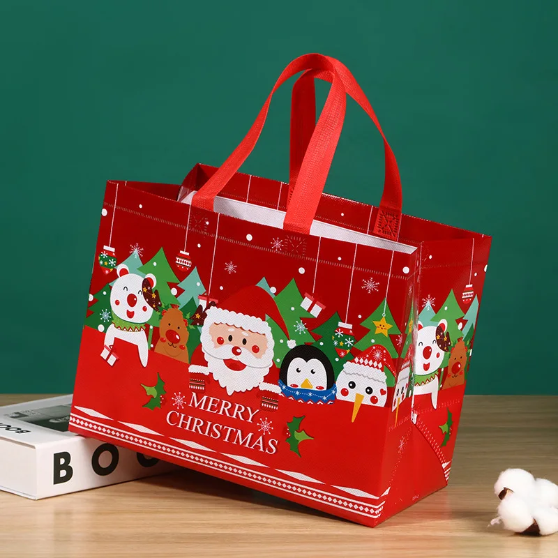 

2024 New In Christmas Gift Bags Cartoon Cute Santa Elk Snowman Printing Non Woven Handbag Hot Pressing Festival Party Supplies