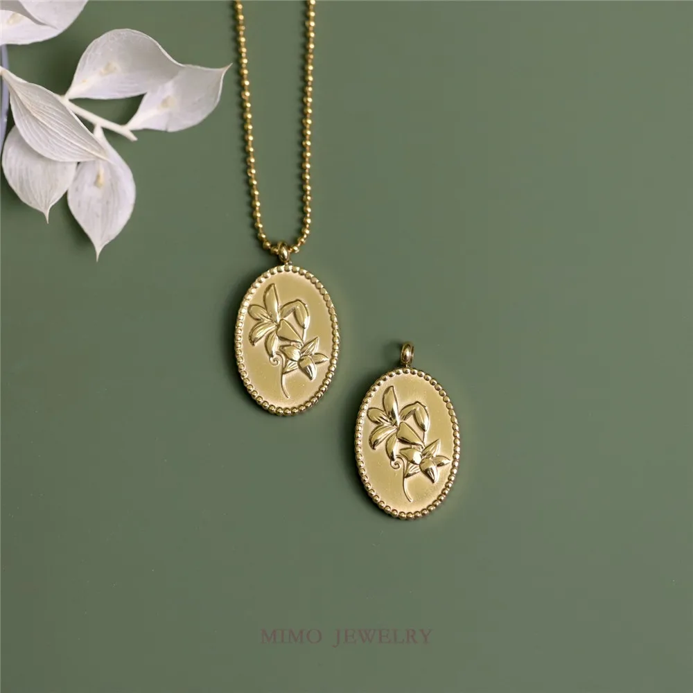 Gold-plated titanium steel double sided lily relief vintage oval pendant DIY accessory
Gold-plated titanium steel double sided lily relief vintage oval pendant DIY accessory
