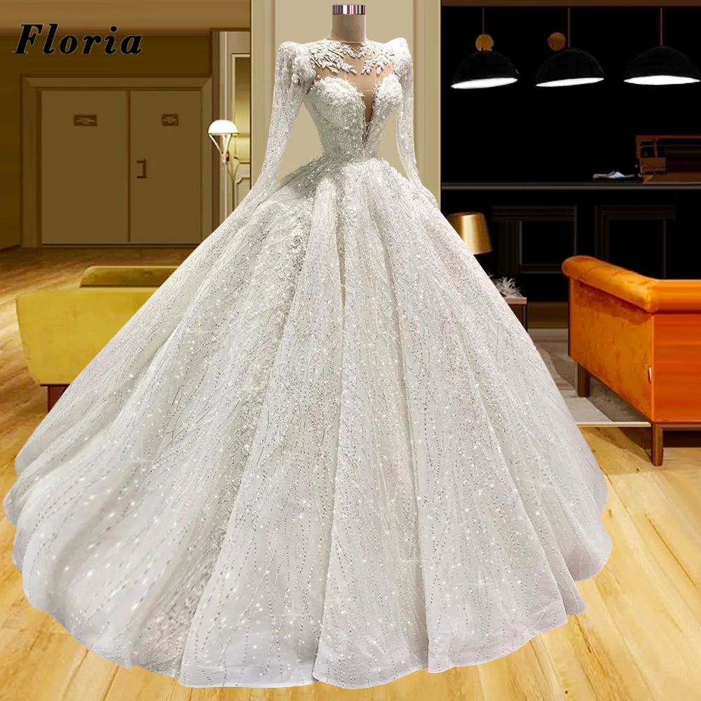 Floria Middle East Long Sleeves Bride Dresses Newest Dubai Sparkly Beads Sequins Wedding Dresses Ball Gown Couture Bridal Gowns
Floria Middle East Long Sleeves Bride Dresses Newest Dubai Sparkly Beads Sequins Wedding Dresses Ball Gown Couture Bridal Gowns