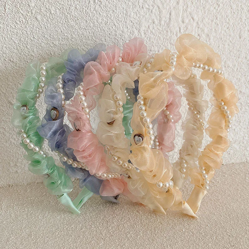 Korean version of the simple pearl winding thin edge headband high-quality mesh pleated headband face wash headhoop female
Korean version of the simple pearl winding thin edge headband high-quality mesh pleated headband face wash headhoop female