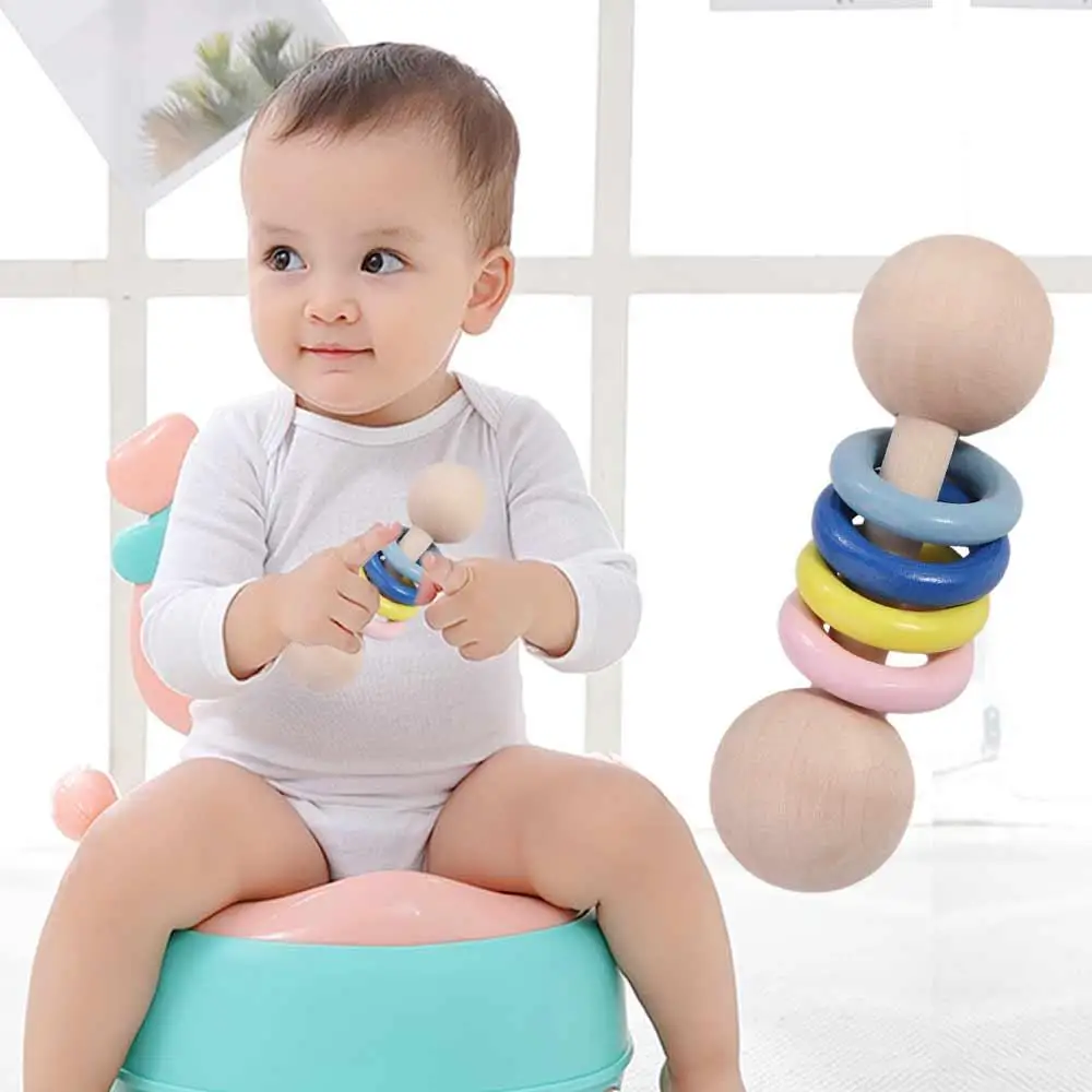 Rainbow Rings Wooden Baby Rattle Toy Wooden Educational Musical HandBell Rattle Toy Early Learning HandBell
Rainbow Rings Wooden Baby Rattle Toy Wooden Educational Musical HandBell Rattle Toy Early Learning HandBell