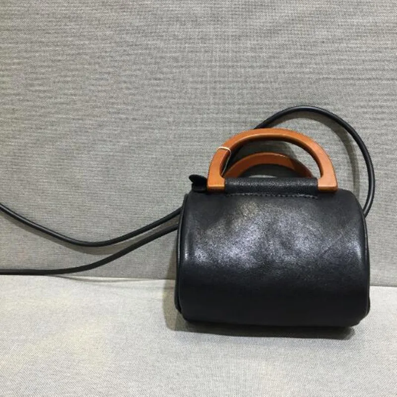 Vintage leather wood handle Plant tanned sheepskin handmade casual wear Accessories Women's shoulder bag crossbody bag
Vintage leather wood handle Plant tanned sheepskin handmade casual wear Accessories Women's shoulder bag crossbody bag