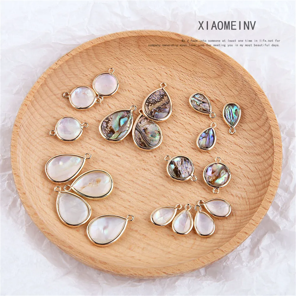 DIY Handmade Jewelry Accessories with Retro Copper Edging Embedded Abalone Circular Double Hanging Water Drop Material
DIY Handmade Jewelry Accessories with Retro Copper Edging Embedded Abalone Circular Double Hanging Water Drop Material