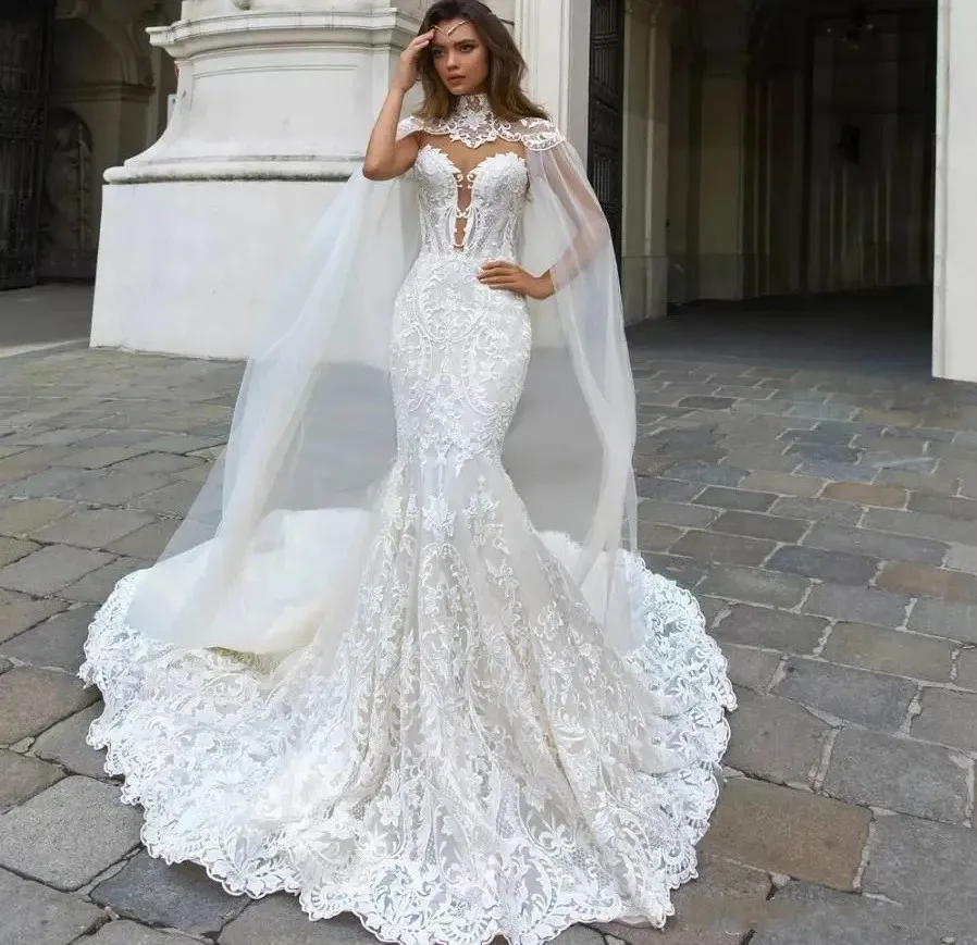 

Gorgeous Mermaid Lace Wedding Dresses With Cape Sheer Plunging Neck Appliqued Bridal Party Gowns Arabic Dubai Vestidos De Novia