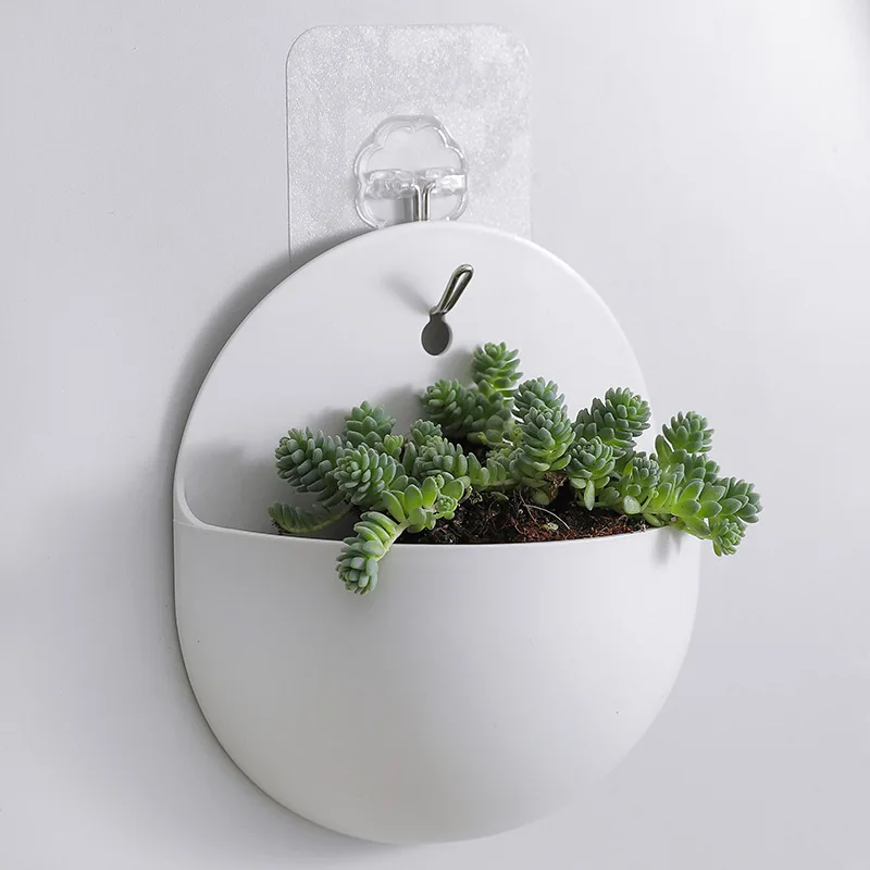 Nordic Wall-hanging Flowerpot Planters Levitating Plant Vase Home Decoration Wall Storage Organizer With Adhesive Hook White
Nordic Wall-hanging Flowerpot Planters Levitating Plant Vase Home Decoration Wall Storage Organizer With Adhesive Hook White