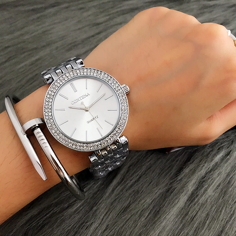 2023 Hot selling fashion luxury silver watch containing stretch marks women's watch women's watch stainless steel watch
2023 Hot selling fashion luxury silver watch containing stretch marks women's watch women's watch stainless steel watch