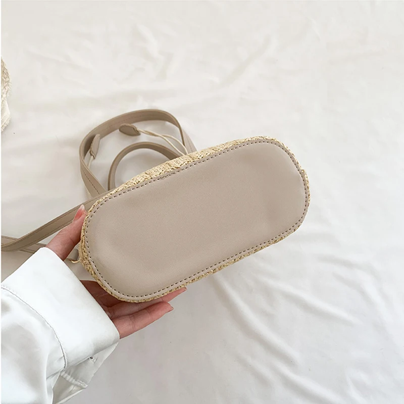 Knit Straw Bucket Tote - Woven Beach Travel Bag with Wrist Handle 22 S488e5e3cf43d4d818a2a690bbc5a3938z