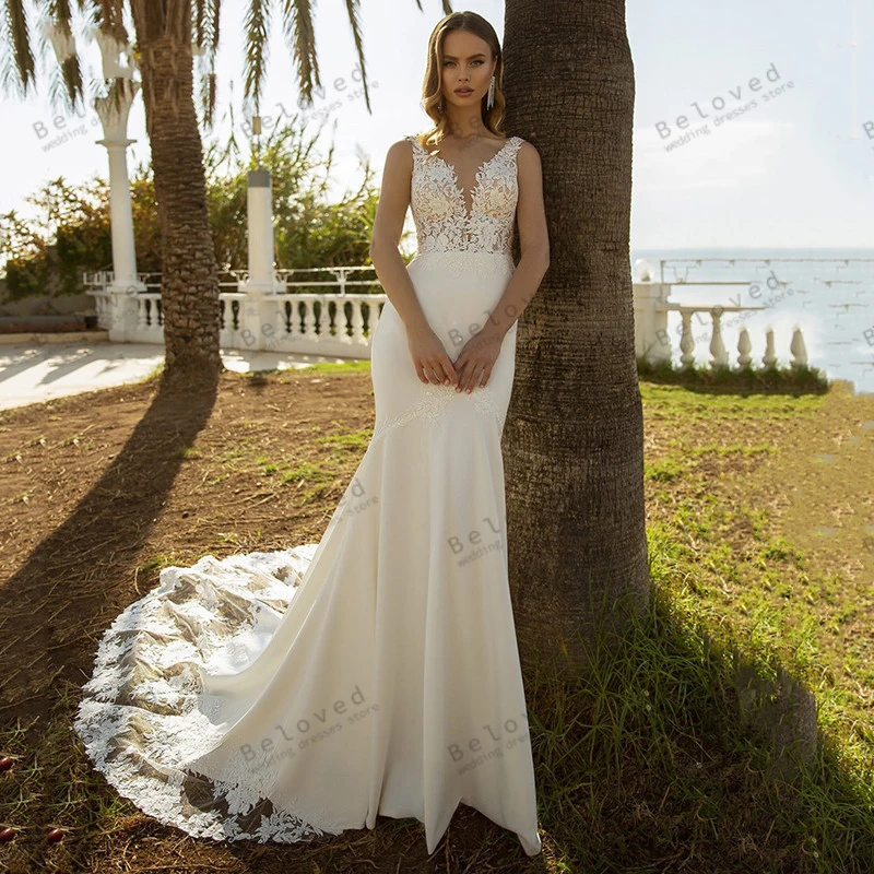 Sexy Wedding Dresses Sleeveless Backless Bridal Gowns Lace Appliques Sheath Mermaid Deep V-Neck Robe For Bride Vestidos De Novia
Sexy Wedding Dresses Sleeveless Backless Bridal Gowns Lace Appliques Sheath Mermaid Deep V-Neck Robe For Bride Vestidos De Novia