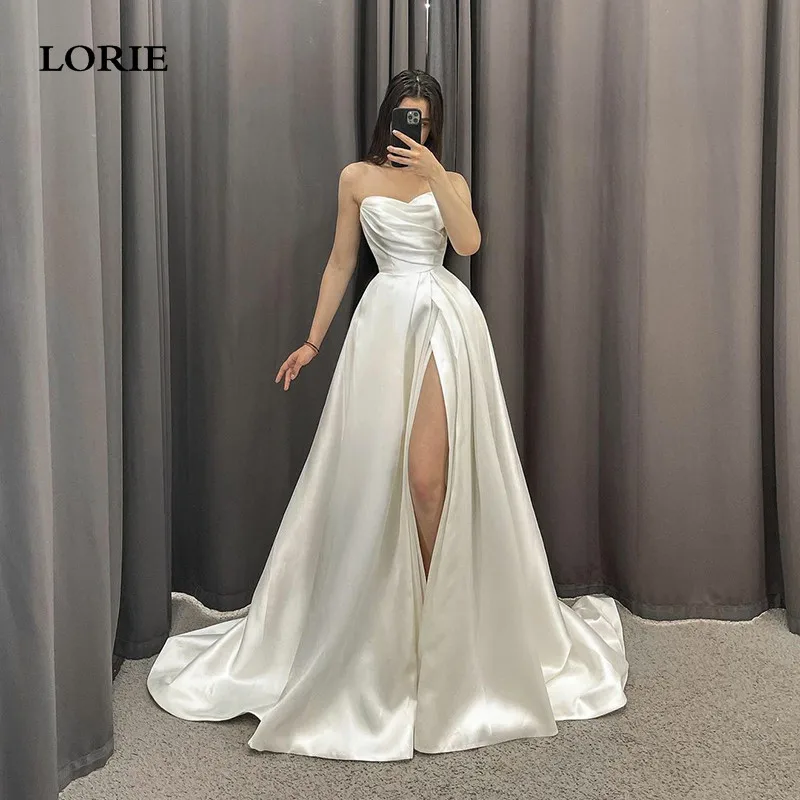 LORIE трапециевидные Свадебные платья без бретелек с Боковым Разрезом Свадебные платья элегантные плиссированные Свадебные платья 2023
LORIE трапециевидные Свадебные платья без бретелек с Боковым Разрезом Свадебные платья элегантные плиссированные Свадебные платья 2023