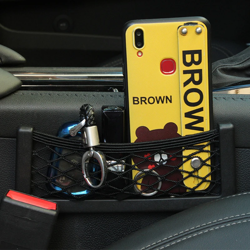 Multifunction Car Storage Bag Phone Holder Organizer Beautiful and Generous Strong and Durable Paste Net Pocket Auto Accessories 
Multifunction Car Storage Bag Phone Holder Organizer Beautiful and Generous Strong and Durable Paste Net Pocket Auto Accessories