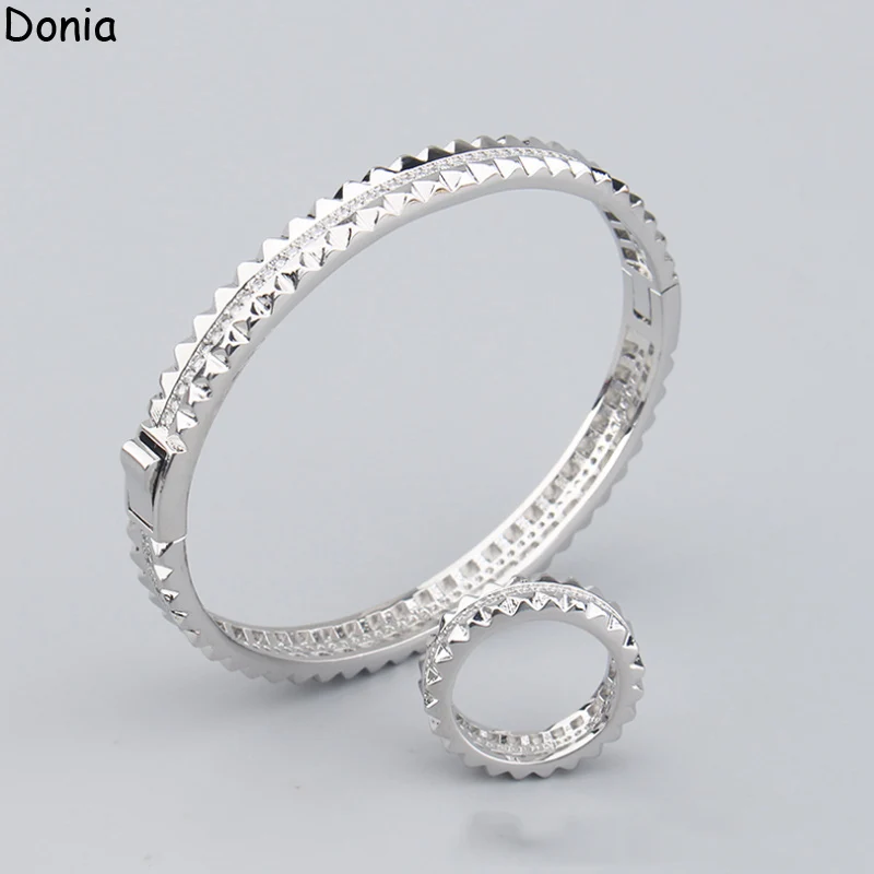 Donia Jewelry European and American titanium steel inlaid AAA zircon rivet bracelet ring luxury jewelry set
Donia Jewelry European and American titanium steel inlaid AAA zircon rivet bracelet ring luxury jewelry set