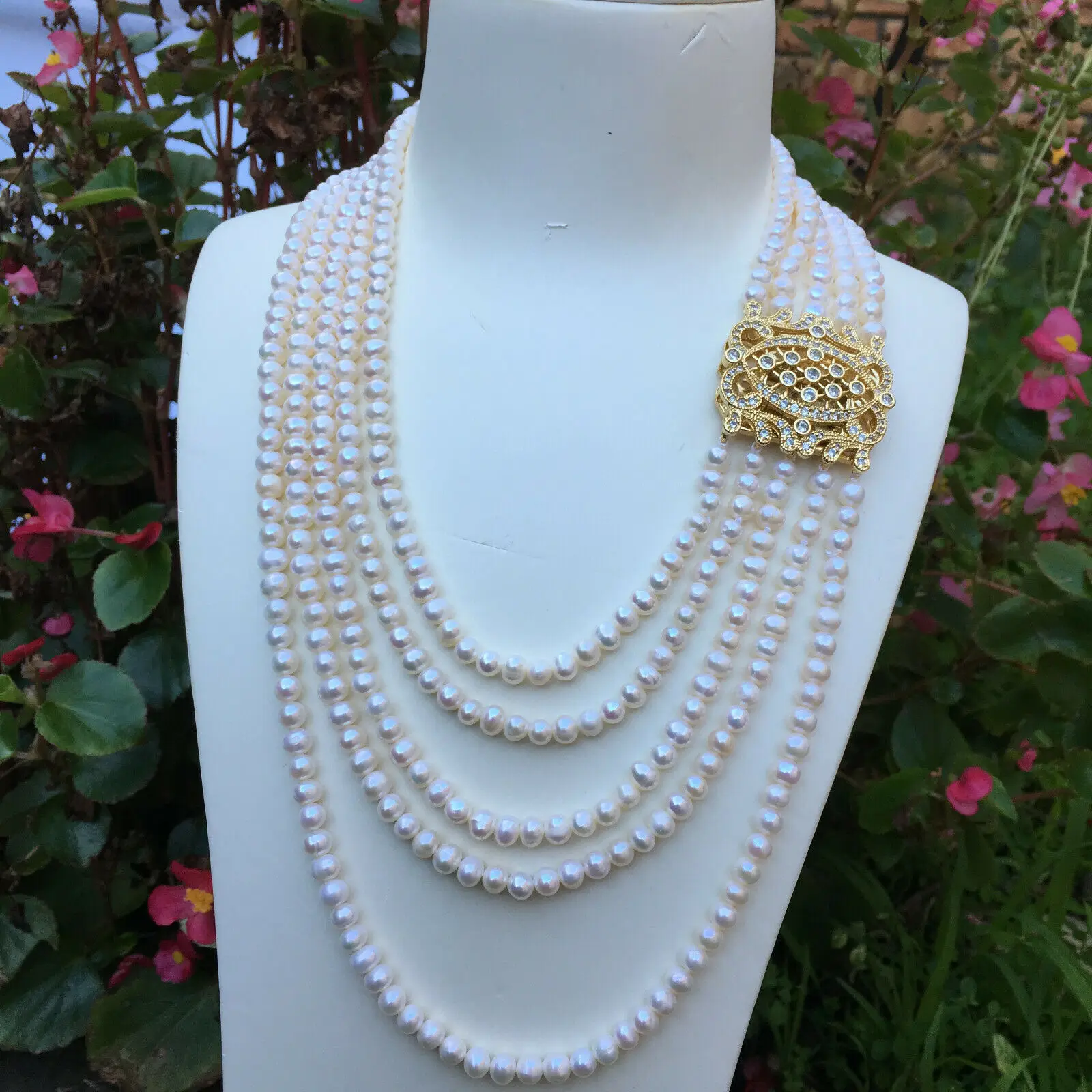 Hand knotted 5rows natural 5-6mm white nearl round freshwater pearl temperament micro inlay zircon necklace 45-60cm
Hand knotted 5rows natural 5-6mm white nearl round freshwater pearl temperament micro inlay zircon necklace 45-60cm