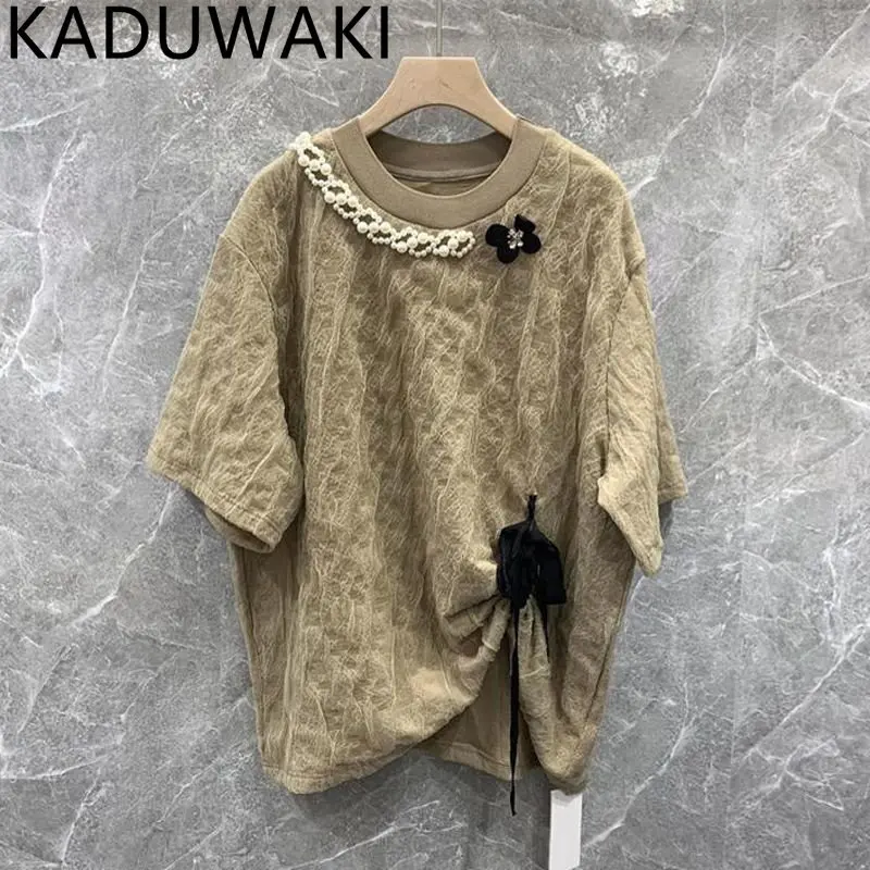 O-neck Tee Pearls Spliced T-Shirts with Bow Tie Drop-Shoulder T-shirt Summer 2023 New All-match Loose Drawstring Crop Top
O-neck Tee Pearls Spliced T-Shirts with Bow Tie Drop-Shoulder T-shirt Summer 2023 New All-match Loose Drawstring Crop Top