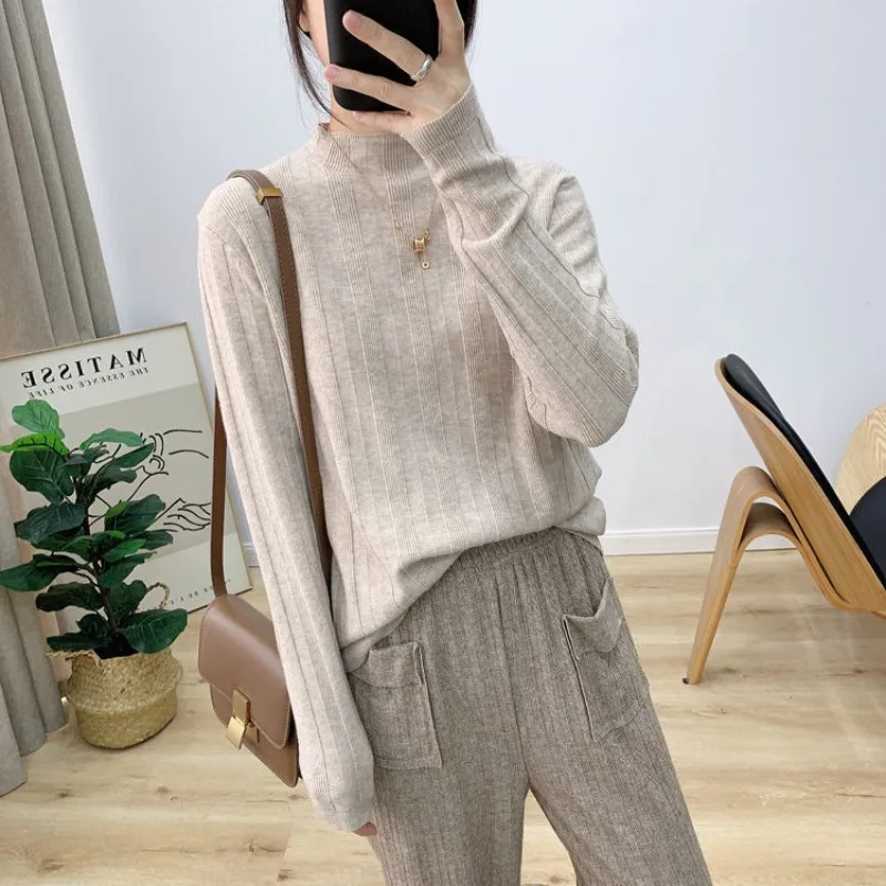 Autumn and Winter Women's Pullover Solid Color Half High Neck Loose Fit Long Sleeve Sweater Knitted Bottom Shirt Fashion Tops
Autumn and Winter Women's Pullover Solid Color Half High Neck Loose Fit Long Sleeve Sweater Knitted Bottom Shirt Fashion Tops
