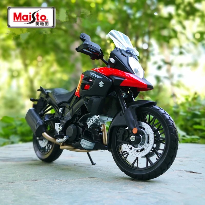 Гоночная модель мотоцикла Maisto 1:12 Suzuki V-Storm из сплава, модель металлического уличного спортивного мотоцикла, Коллекционная модель, детская игрушка в подарок
Гоночная модель мотоцикла Maisto 1:12 Suzuki V-Storm из сплава, модель металлического уличного спортивного мотоцикла, Коллекционная модель, детская игрушка в подарок