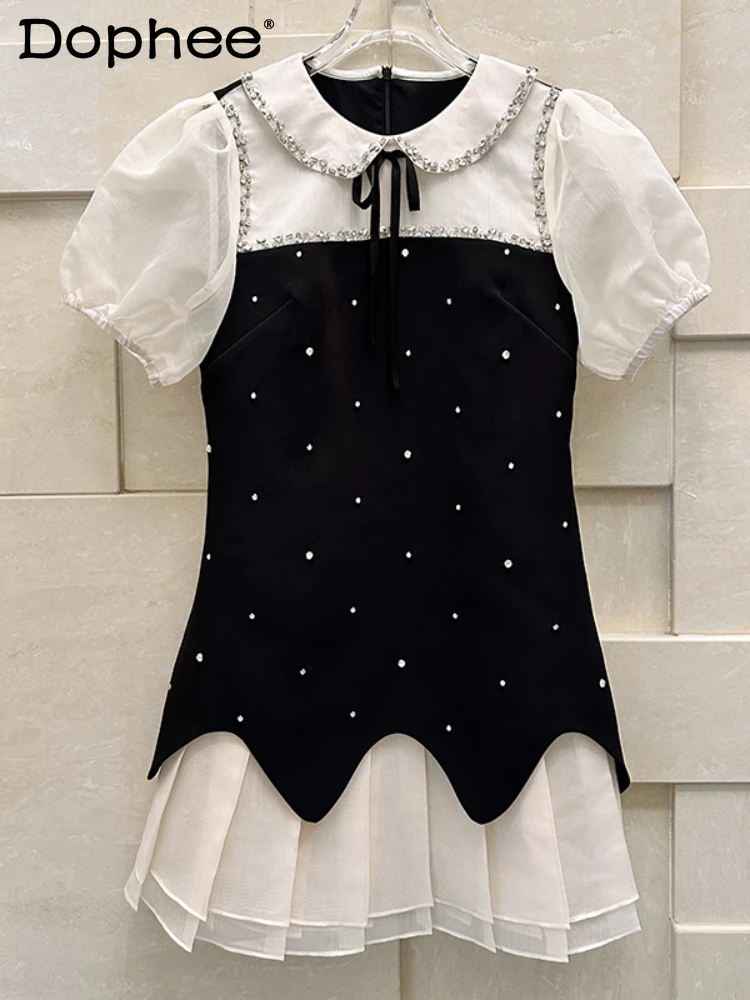 Sweet Girl Doll Collar Party Black Dress 2024 Summer French Puff Sleeve Heavy Industry Rhinestone Retro Fashion Dress for Women
Sweet Girl Doll Collar Party Black Dress 2024 Summer French Puff Sleeve Heavy Industry Rhinestone Retro Fashion Dress for Women