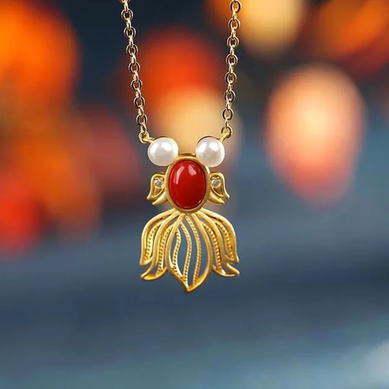 Classical exquisite southern red tourmaline pearl small goldfish pendant ladies necklace Chinese style fresh silver jewelry
Classical exquisite southern red tourmaline pearl small goldfish pendant ladies necklace Chinese style fresh silver jewelry