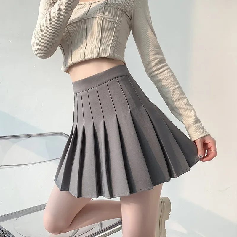 

Модная женская плиссированная мини-юбка, уличная одежда в японском и готическом стиле, тонкая трапециевидная однотонная короткая юбка с высокой талией Jk для женщин, одежда