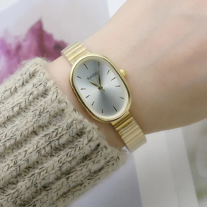 

Женские кварцевые часы 2024, роскошные овальные модные мини-часы с маленьким корпусом и циферблатом с римскими цифрами, женские наручные часы с полным цифровым циферблатом