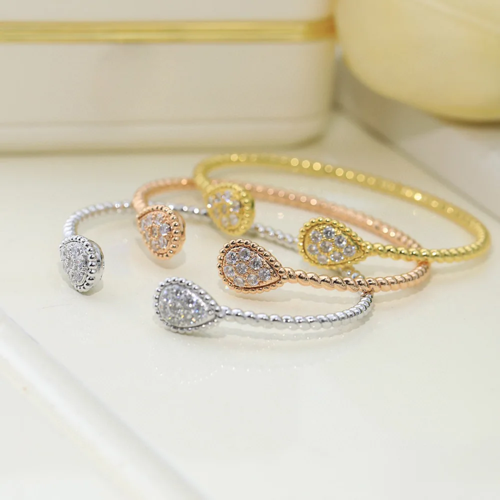 Романтический Модный браслет в форме капли воды женские свадебные аксессуары женский подарок изысканный AAAA фирменные ювелирные изделия из циркония Роскошная классика
Романтический Модный браслет в форме капли воды женские свадебные аксессуары женский подарок изысканный AAAA фирменные ювелирные изделия из циркония Роскошная классика