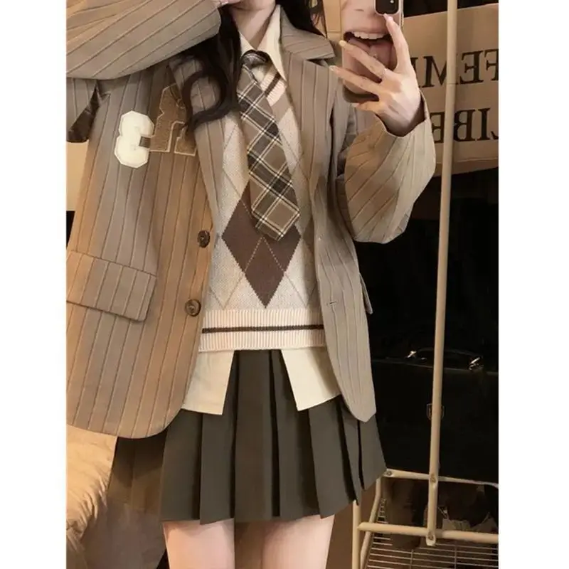 Three piece British preppy women 2024 Autumn and Winter tie shirt vest suit jacket shirt pleated skirt
Three piece British preppy women 2024 Autumn and Winter tie shirt vest suit jacket shirt pleated skirt