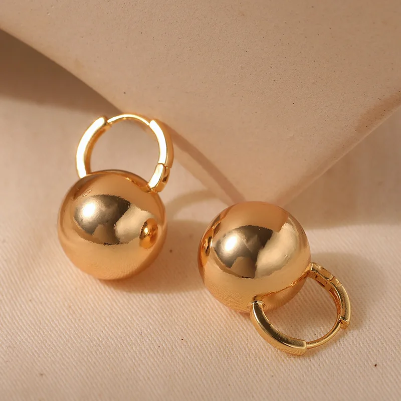 Chic 18k Gold Plated Metal Small Round Ball Hoop Earrings Charm Gold Color Tarnish Free Trendy Fashion Jewelry for Women Bijoux
Chic 18k Gold Plated Metal Small Round Ball Hoop Earrings Charm Gold Color Tarnish Free Trendy Fashion Jewelry for Women Bijoux