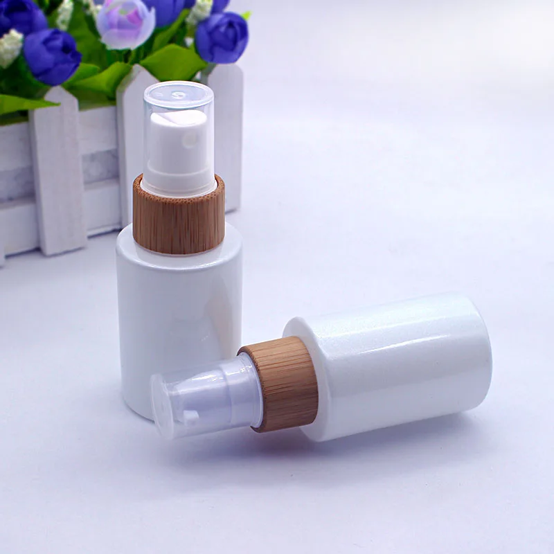 Pearl White Glass Emulsion Essential Oil Bottle Perfume Spray Pump Lid Cosmetic Packaging Container Eco-friendly Bamboo Cap 
Pearl White Glass Emulsion Essential Oil Bottle Perfume Spray Pump Lid Cosmetic Packaging Container Eco-friendly Bamboo Cap