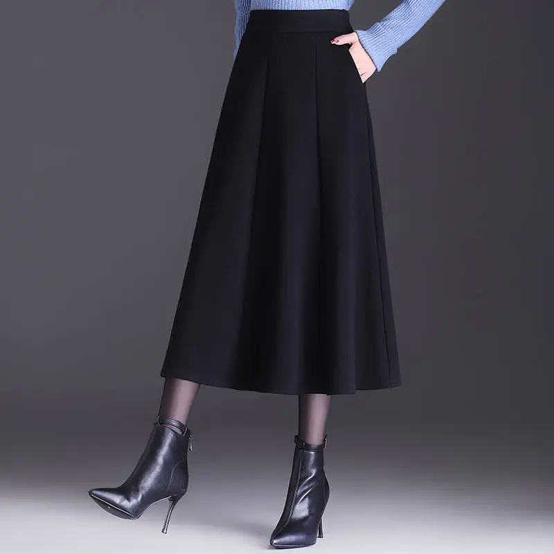 

2023 New Women's Autumn Winter High Waist A-line Skirts Female Loose Big Swing Skirts Ladies Solid Color Woolen Skirts A427