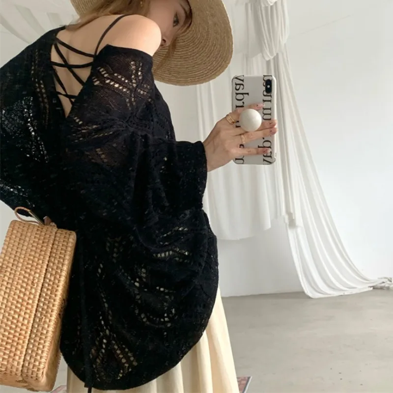 Women V-neck Tops Solid Loose Clothes Spring and Summer White Black Knitted Blouse Korean Sexy Hollow Out Backless Shirt 28228
Women V-neck Tops Solid Loose Clothes Spring and Summer White Black Knitted Blouse Korean Sexy Hollow Out Backless Shirt 28228