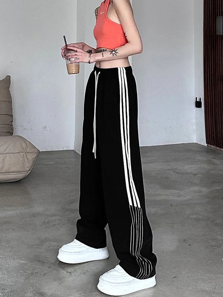 Zoki Y2K Striped Black Sweatpants Women Hip Hop Streetwear Loose Pants American Retro High Waist Harajuku Bf Casual Trousers New
Zoki Y2K Striped Black Sweatpants Women Hip Hop Streetwear Loose Pants American Retro High Waist Harajuku Bf Casual Trousers New