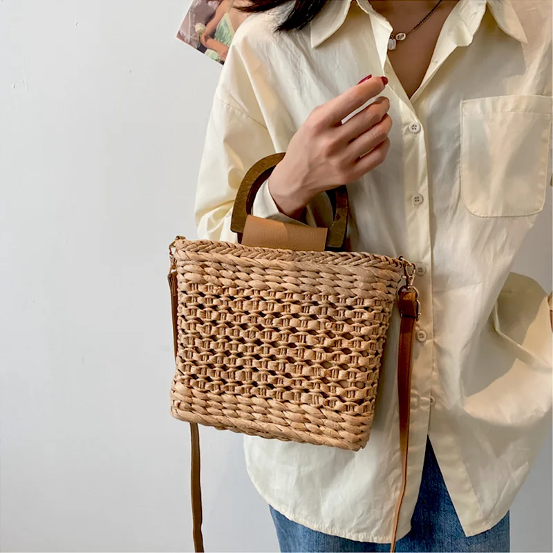 2023 New Summer Women's Fashion Handbag Designer Handbag Bag Woven Drawstring Closed Wooden Handle Beach Shoulder Bag
2023 New Summer Women's Fashion Handbag Designer Handbag Bag Woven Drawstring Closed Wooden Handle Beach Shoulder Bag