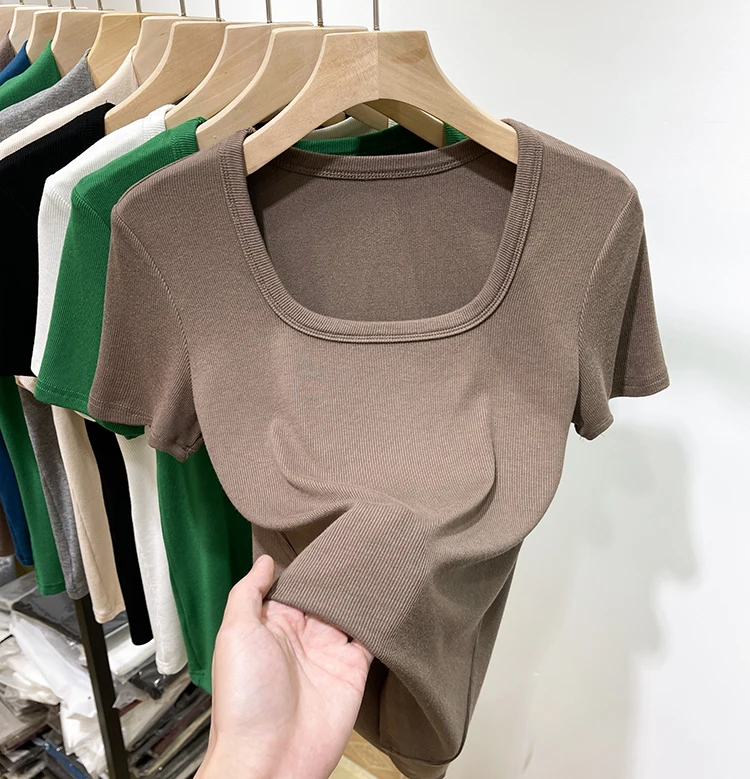 تي شيرت نسائي جديد لعام 2024 بقصة ضيقة وأكمام قصيرة، ياقة مربعة مع تصميم خيوط، أنيق للربيع والصيف، ملابس كاجوال عصرية تي شيرت نسائي جديد لعام 2024 بقصة ضيقة وأكمام قصيرة، ياقة مربعة مع تصميم خيوط، أنيق للربيع والصيف، ملابس كاجوال عصرية