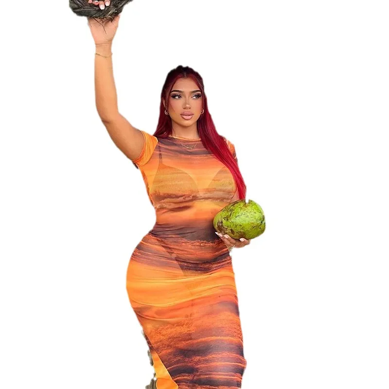 2023 Summer Women's Perspective Mesh Gradient Print Round Neck Short Sleeve Wrapped Hip Split Beach Dress
2023 Summer Women's Perspective Mesh Gradient Print Round Neck Short Sleeve Wrapped Hip Split Beach Dress