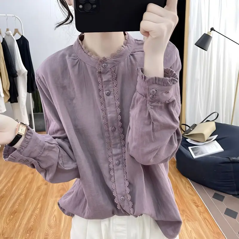 2023 New Spring and Autumn Vintage Standing Collar Ruffle Sleeve Lace Panel Button Commuter Casual Solid Color Women's Shirt
2023 New Spring and Autumn Vintage Standing Collar Ruffle Sleeve Lace Panel Button Commuter Casual Solid Color Women's Shirt