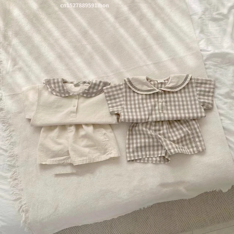 2023 Summer New Baby Navy Collar Plaid Clothes Set Children Short Sleeve Tops + Shorts 2pcs Suit For Boys Girls Infant Outfits
2023 Summer New Baby Navy Collar Plaid Clothes Set Children Short Sleeve Tops + Shorts 2pcs Suit For Boys Girls Infant Outfits