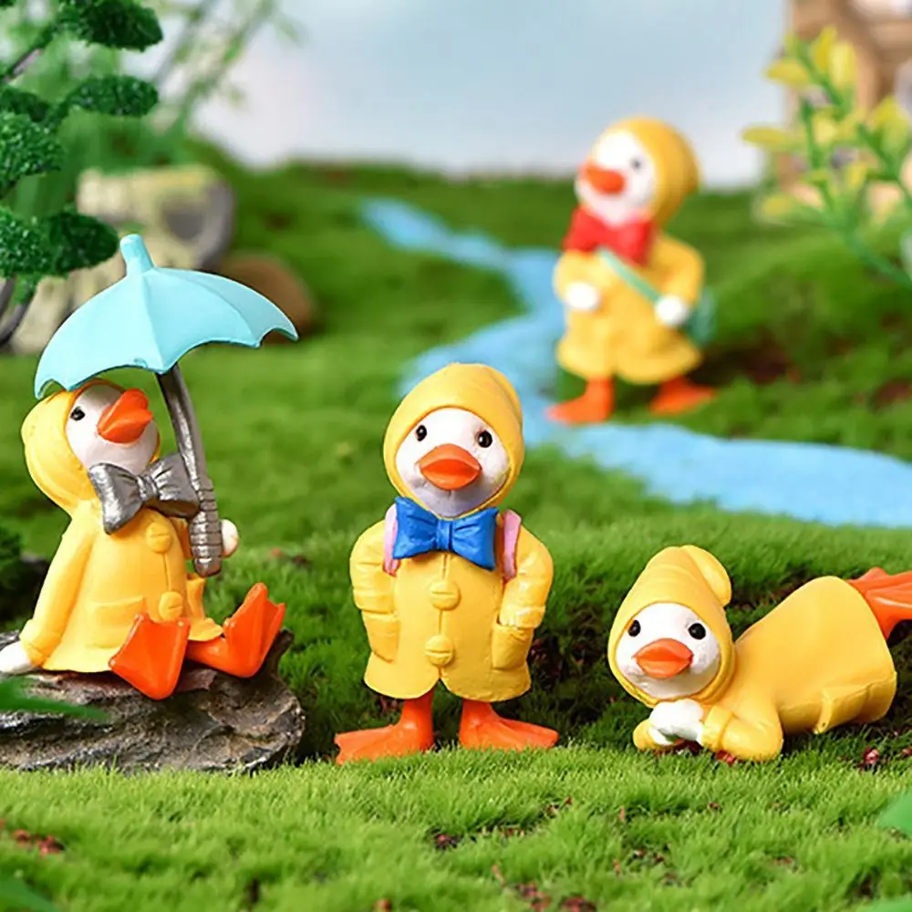 4pcs Cute Cartoon Umbrella Raincoat Duck Miniature Figurine Ornaments Yellow Ducklings Figurine for Micro Garden Landscape Decor
4pcs Cute Cartoon Umbrella Raincoat Duck Miniature Figurine Ornaments Yellow Ducklings Figurine for Micro Garden Landscape Decor
