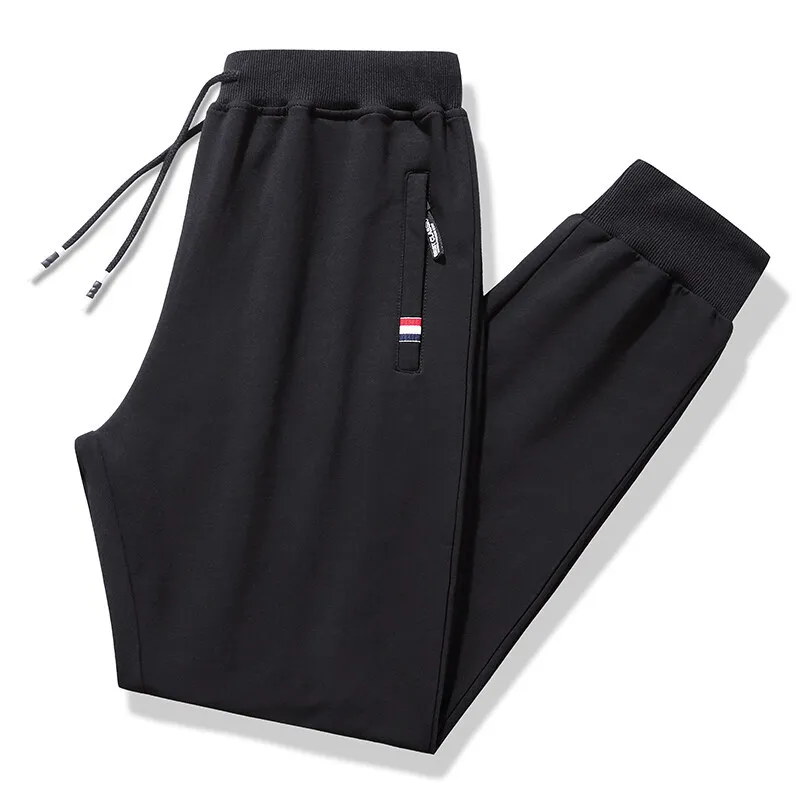 

New Autumn Sweatpants Men Plus Size 8XL Sportswear Elastic Waist Casual Cotton Track Pants Straight Trousers Man Black Joggers