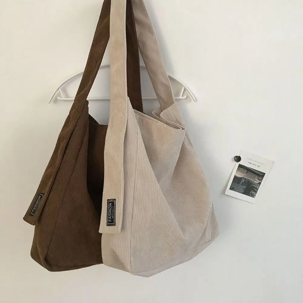Portable Fashion Corduroy Shoulder Bag Cute Simple Large Capacity Tote Bag Women Casual Cotton Cloth Handbag
Portable Fashion Corduroy Shoulder Bag Cute Simple Large Capacity Tote Bag Women Casual Cotton Cloth Handbag