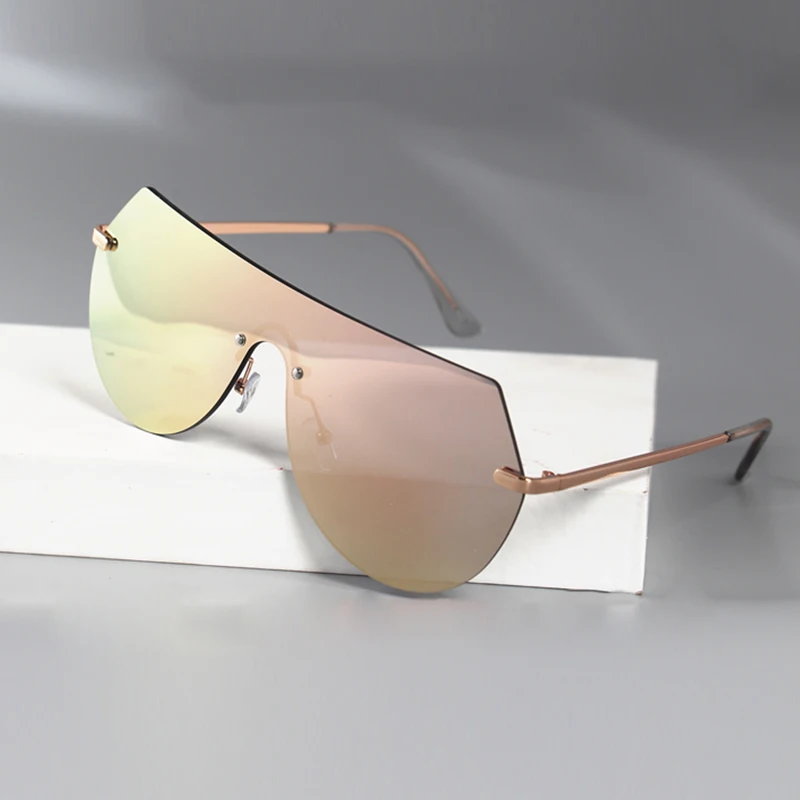 Kenbo Fashion Rimless Women Men Oversized One-piece Mirror Sunglasses Brand Designer Vintage Shield Sunglasses UV400 Eyewear
Kenbo Fashion Rimless Women Men Oversized One-piece Mirror Sunglasses Brand Designer Vintage Shield Sunglasses UV400 Eyewear