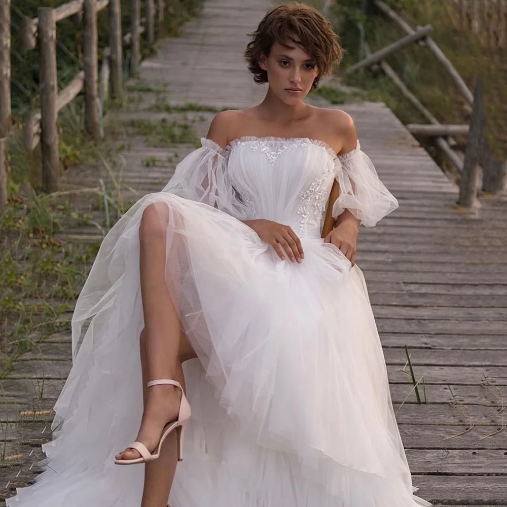 Sexy Beach Wedding Dresses Lace Beads Vintage Boho Wedding Gowns Puff Short Sleeve Bridal Dress Plus Size Corset Back Strapless
Sexy Beach Wedding Dresses Lace Beads Vintage Boho Wedding Gowns Puff Short Sleeve Bridal Dress Plus Size Corset Back Strapless