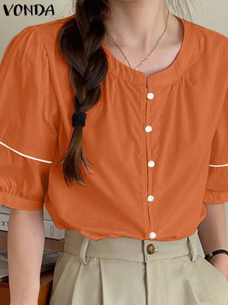 Женская блузка с оборками VONDA 2024, летние элегантные рубашки с коротким рукавом, однотонные повседневные свободные топы с круглым вырезом и пуговицами, блузы большого размера 
Женская блузка с оборками VONDA 2024, летние элегантные рубашки с коротким рукавом, однотонные повседневные свободные топы с круглым вырезом и пуговицами, блузы большого размера