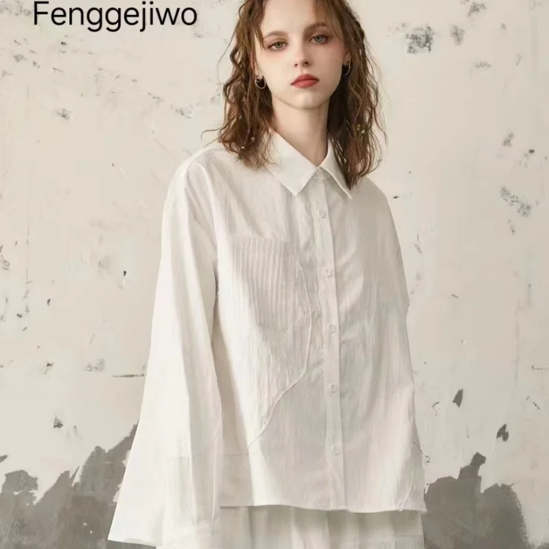 

Fenggejiwo women's casual white shirt with slightly loose fit, one size fits all