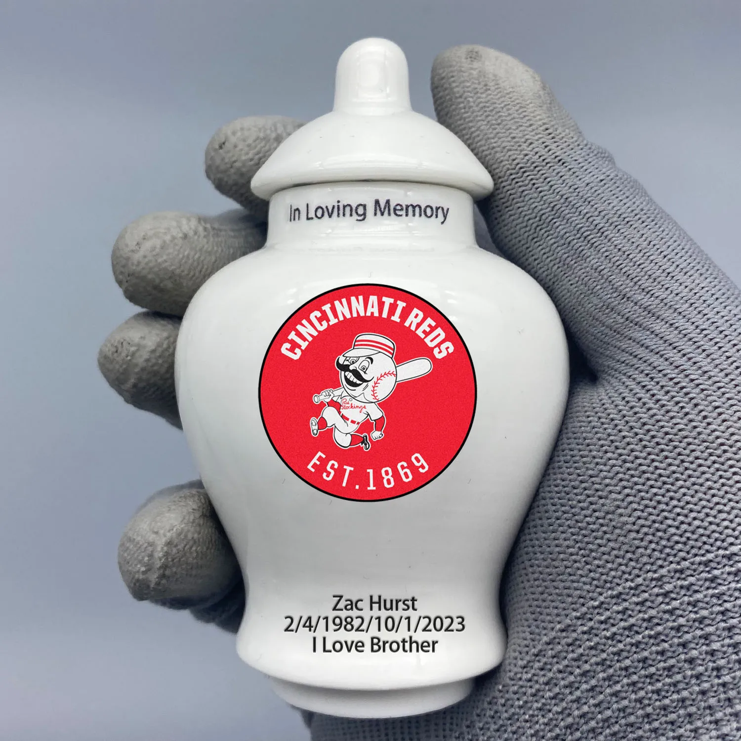 

Mini Urn for Cincinnati Reds-themed Logo Custom Urn.Send me the name/date you want to appear on the urn by Remarks Message