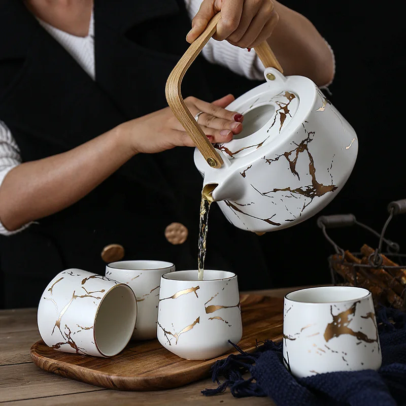 Ceramic household tea set with clamp seat, black and white, Japanese style, tea cup, with locust clamp seat
Ceramic household tea set with clamp seat, black and white, Japanese style, tea cup, with locust clamp seat