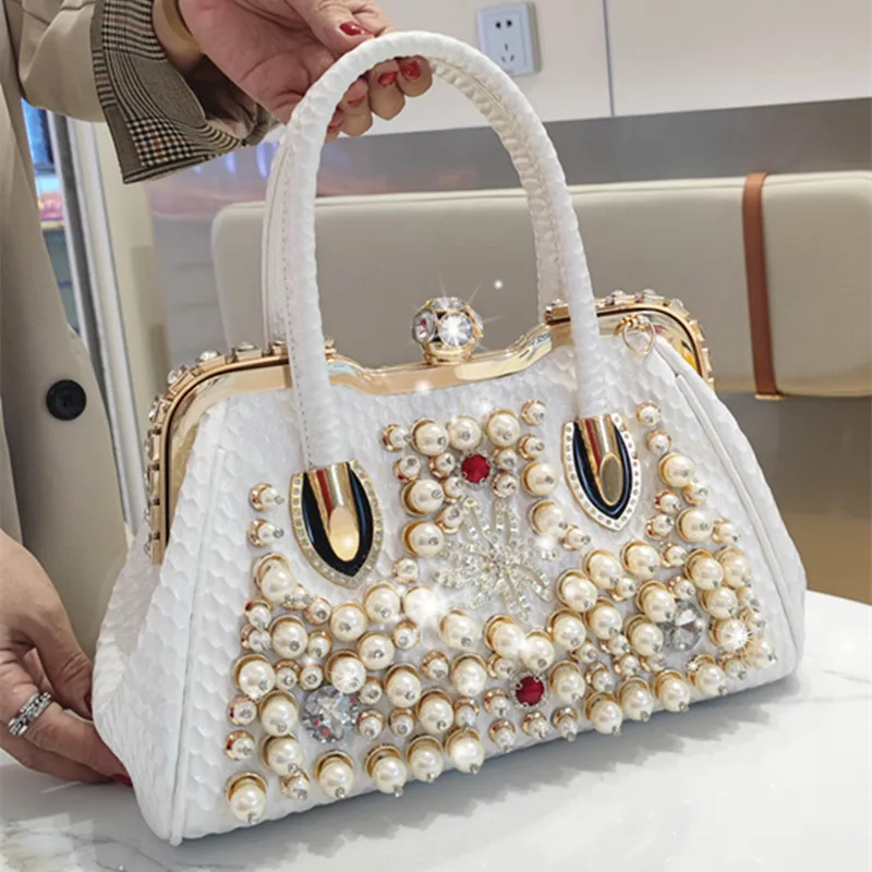 Luxury Fashion Pearl Women Handbags 2023 New Genuine Leather Diamond Shoulder Crossbody Evening Bag Portable Rhinestone Lock Bag
Luxury Fashion Pearl Women Handbags 2023 New Genuine Leather Diamond Shoulder Crossbody Evening Bag Portable Rhinestone Lock Bag